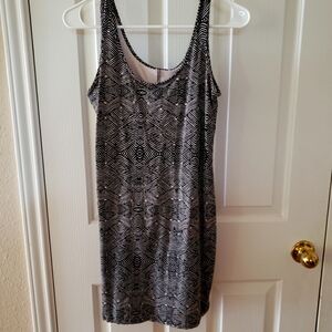 Black in white sexy body fitting mini dress. Size small